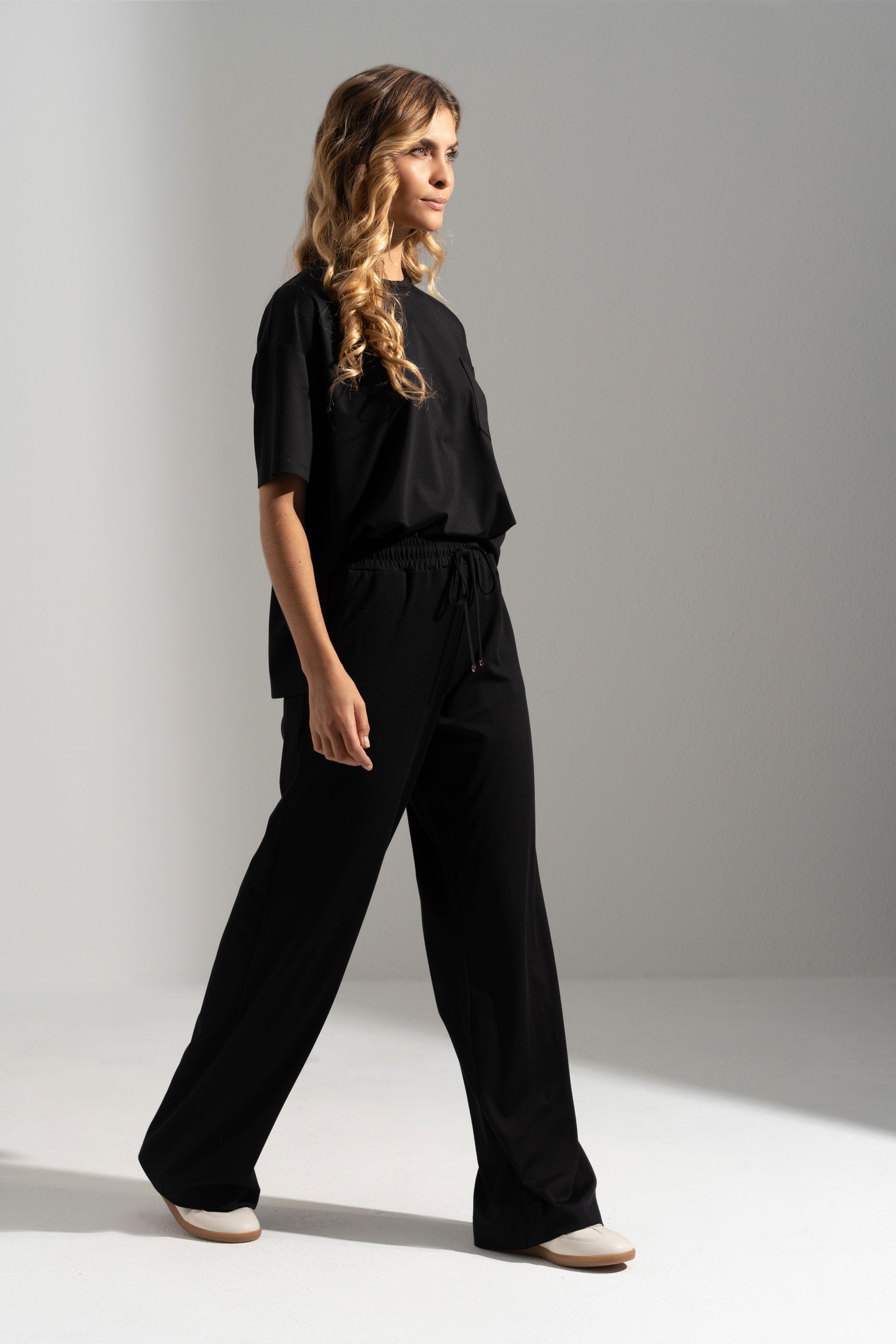 CALÇA FERRACHE DE MALHA WIDE LEG COM CINTURA ELÁSTICA - Carla Valente
