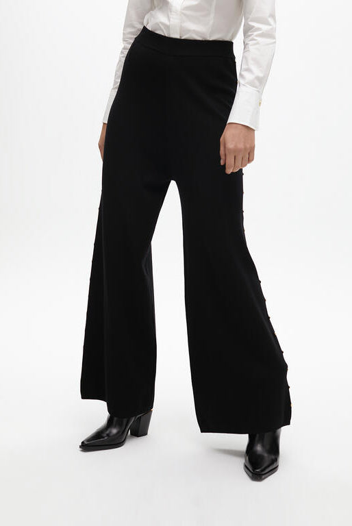 CALÇA LOLA CASADMMNT RETA DE MALHA TACHAS LATERAIS - Carla Valente