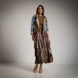 SAIA ALBNS EM PELE SINTÉTICA COM 3 BABADOS - Carla Valente