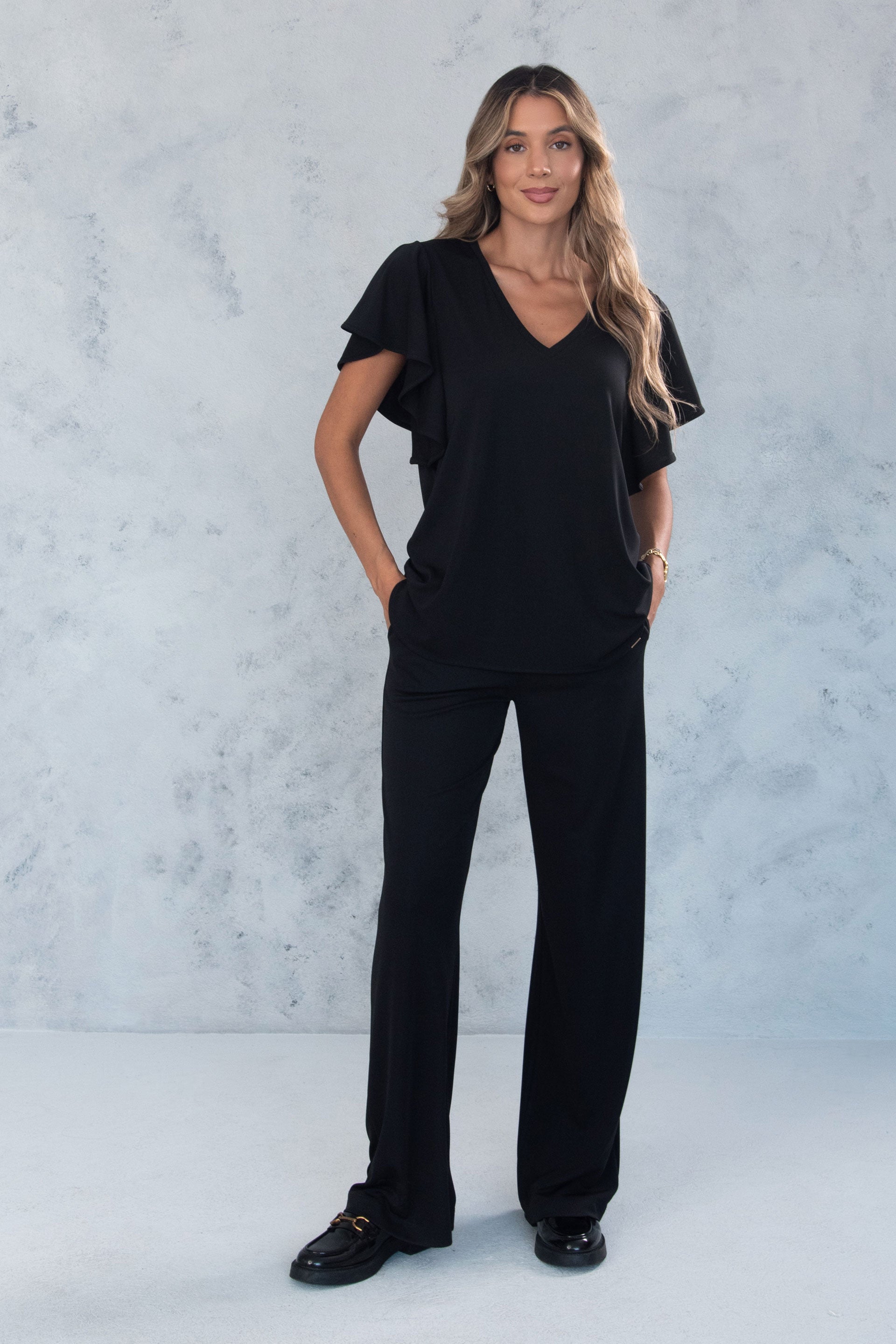 CALÇA FERRACHE WIDE LEG EM MALHA - Carla Valente