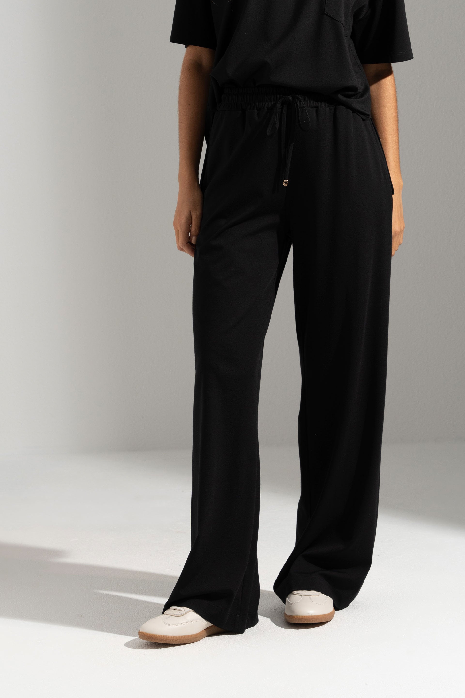 CALÇA FERRACHE DE MALHA WIDE LEG COM CINTURA ELÁSTICA - Carla Valente