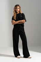 CALÇA FERRACHE DE MALHA WIDE LEG COM CINTURA ELÁSTICA - Carla Valente