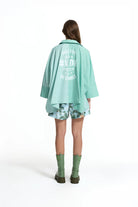 CAMISA VDR CORTE FOLGADO COM ESTAMPA NAS COSTAS - Carla Valente