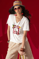 T-SHIRT FOURSOUL LOOSE DECOTE EM V - Carla Valente
